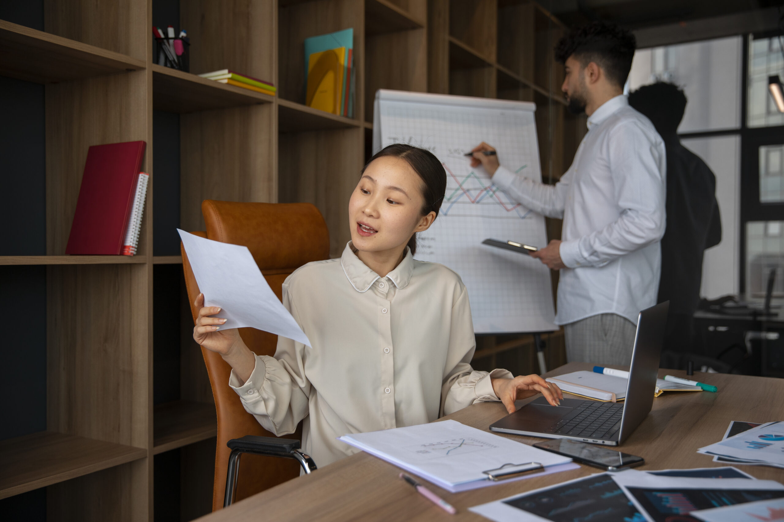 office-workers-using-finance-graphs